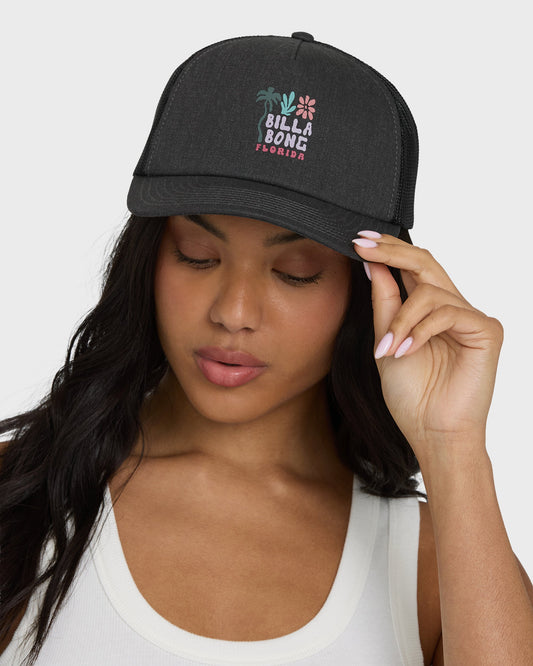 Black trucker hat with mesh back and colorful floral embroidery design on front panel.