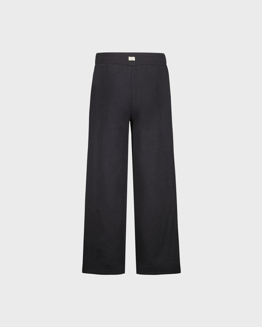 Black pants on a light gray background