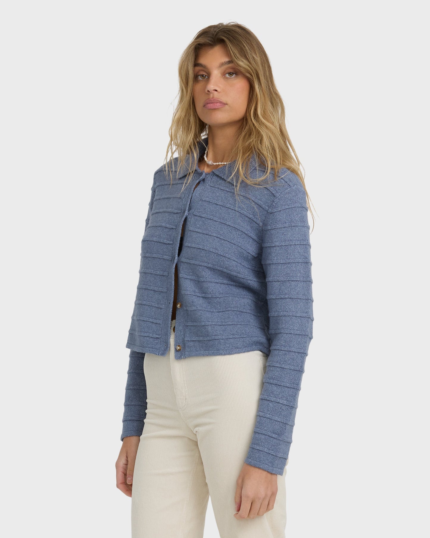 Stone blue ribbed button-front sweater with collar, cropped length.
