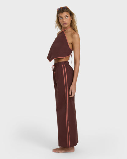 Teak elastic waist pants with side stripes and drawstring, shown with matching halter top.