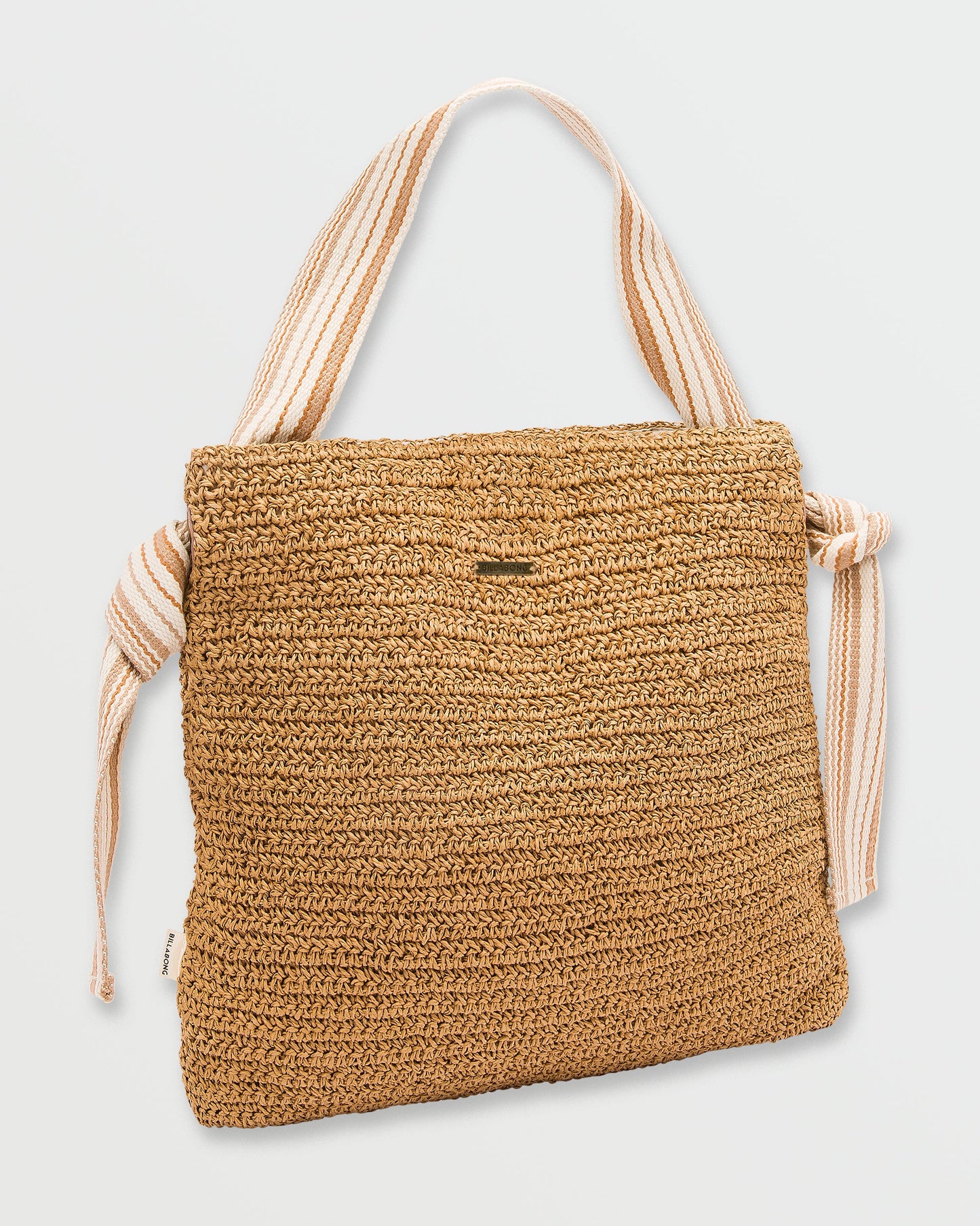 Tan woven straw tote bag with striped canvas handles and knotted side drawstring details.