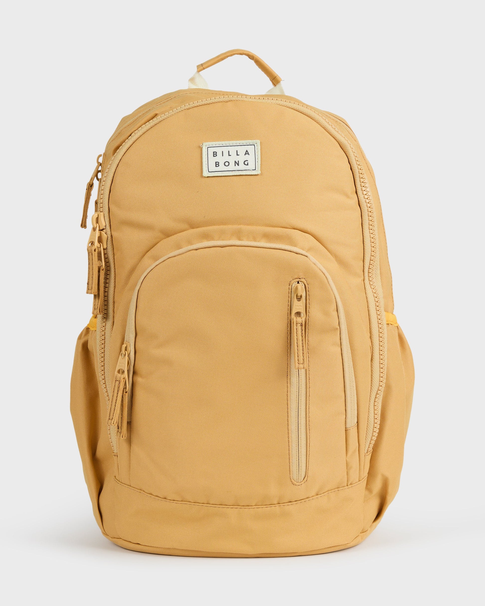 Honey-colored backpack with padded straps, front zipper pocket, and Billabong brand label.