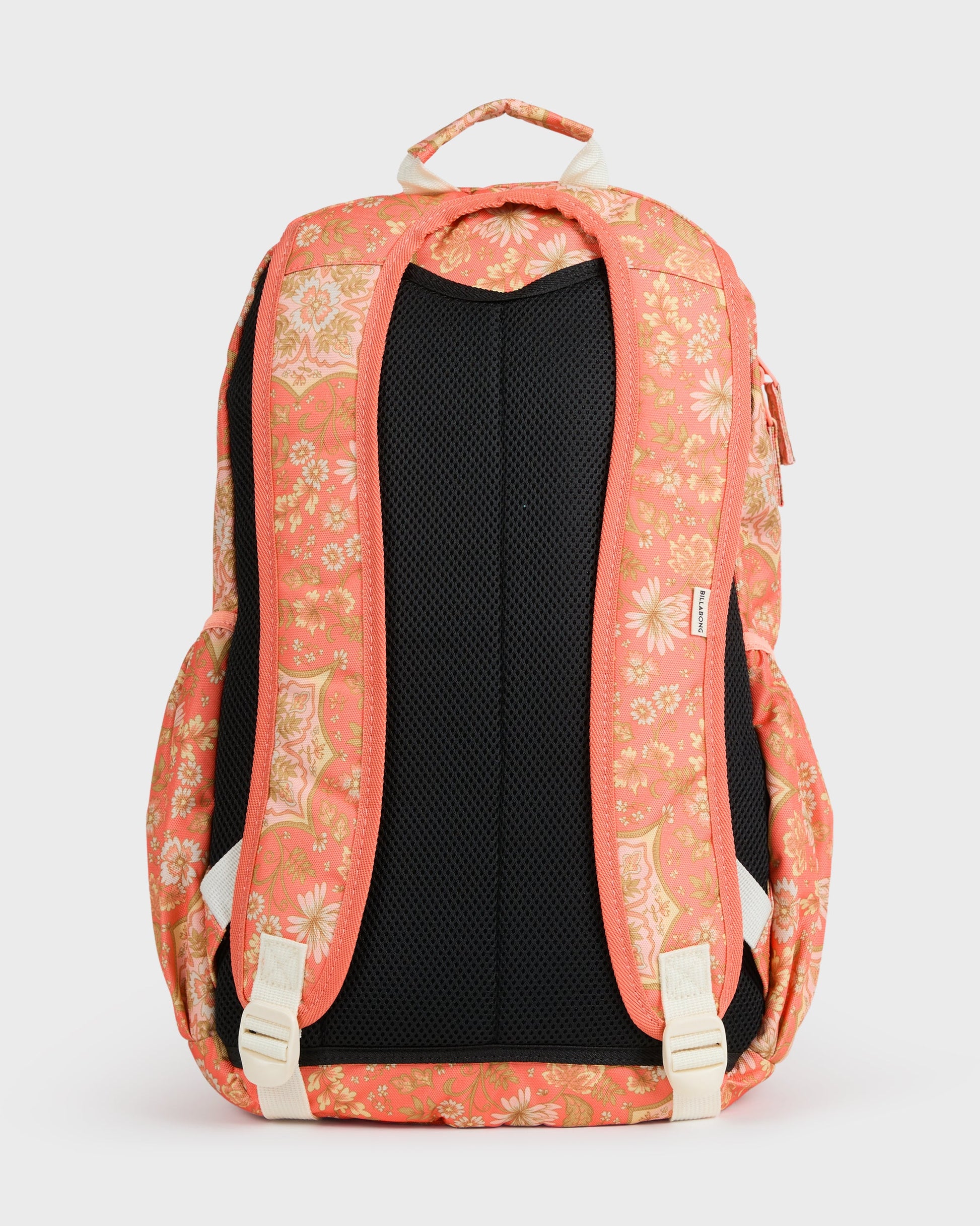 Coral backpack with yellow floral pattern, black mesh back panel, and cream-colored straps and handles.