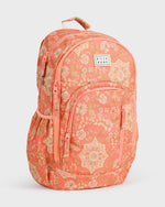 Coral backpack with floral and geometric pattern, front zippered pockets, padded straps, and Billabong branded patch.