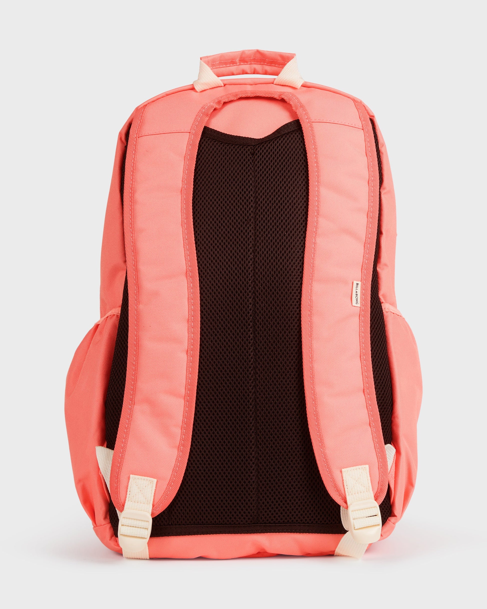Coral-colored backpack with cream shoulder straps and black mesh back panel, shown from rear view.