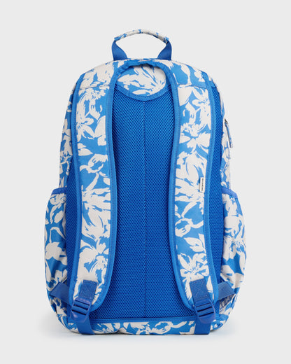 Blue backpack with white floral print, padded shoulder straps, mesh back panel, and top carry handle.