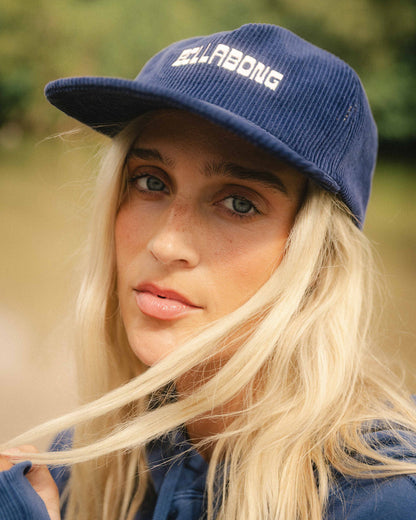 Celestial blue corduroy grandpa hat with white embroidered text on front and curved brim.