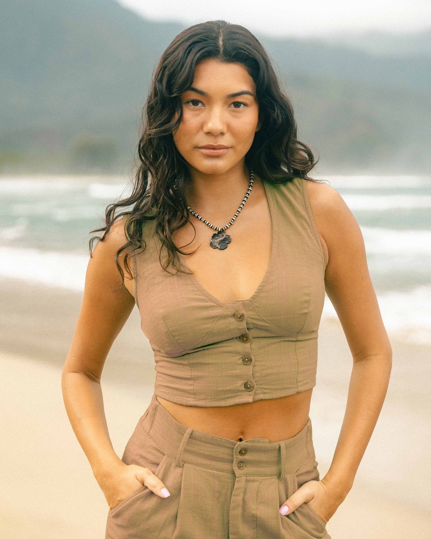 Tailor Made Vest in dijon tan with button front and fitted waist, styled as a crop top.