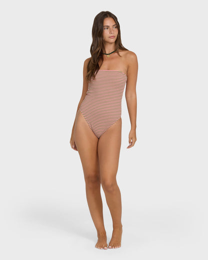 Cedar striped strapless one-piece swimsuit on model with high-cut leg opening.