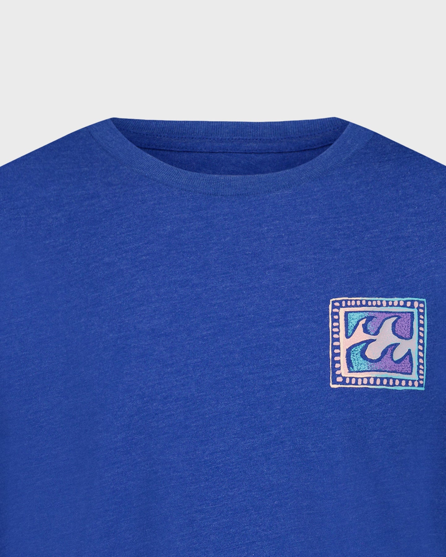 Blue t-shirt with a small logo on the chest against a light gray background