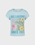 Light blue t-shirt with Billabong logo and floral design on a light gray background