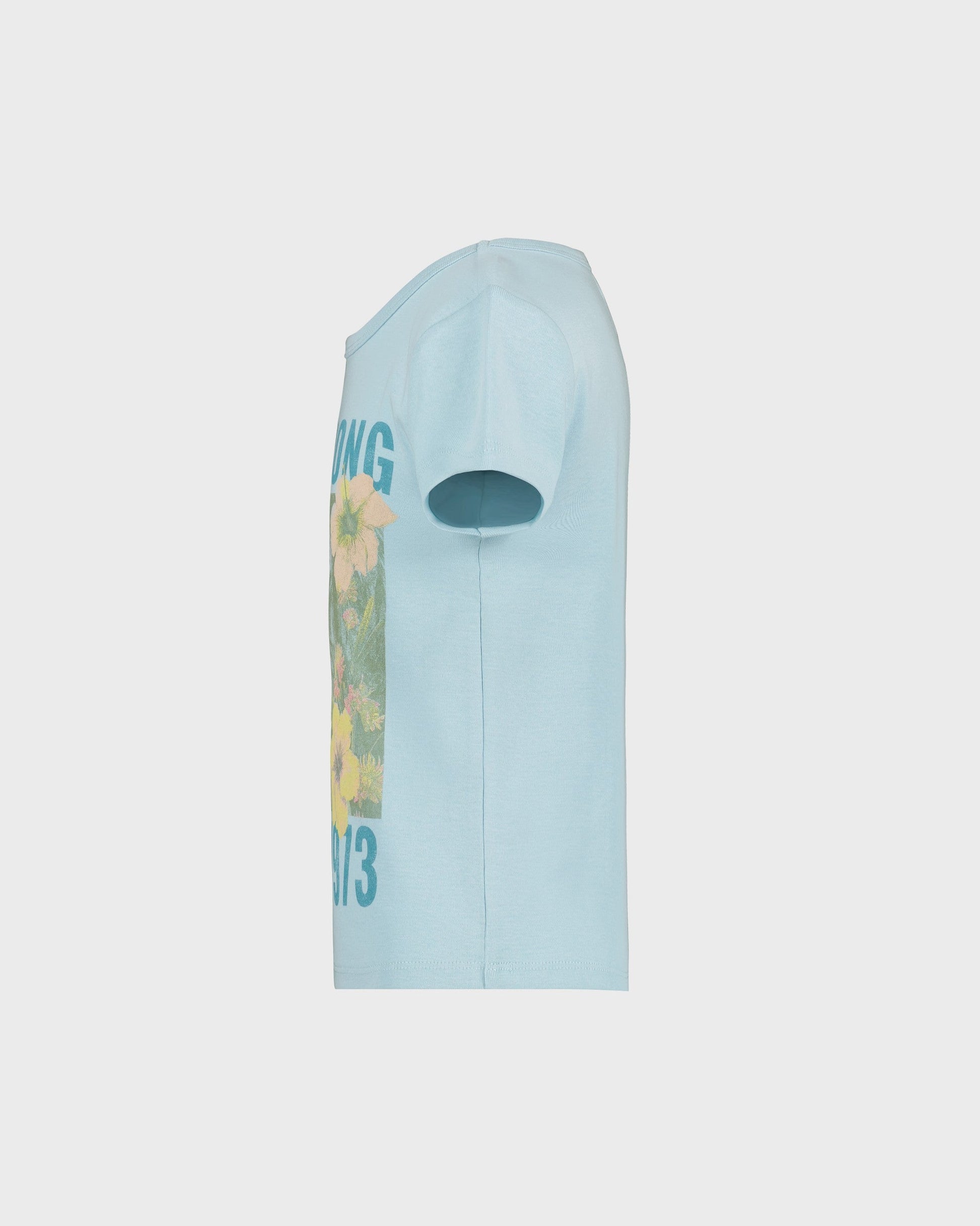 Light blue t-shirt with floral design and text on a white background