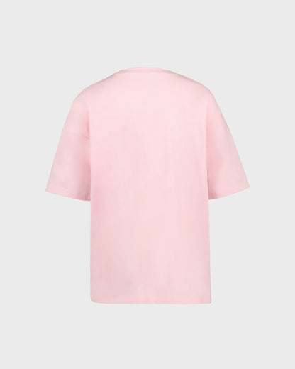 Pink blouse on a light gray background