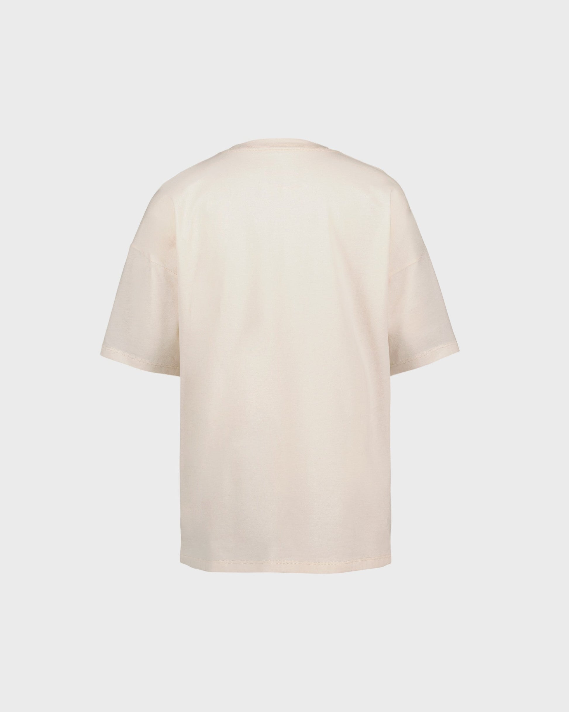 Beige t-shirt on a light gray background