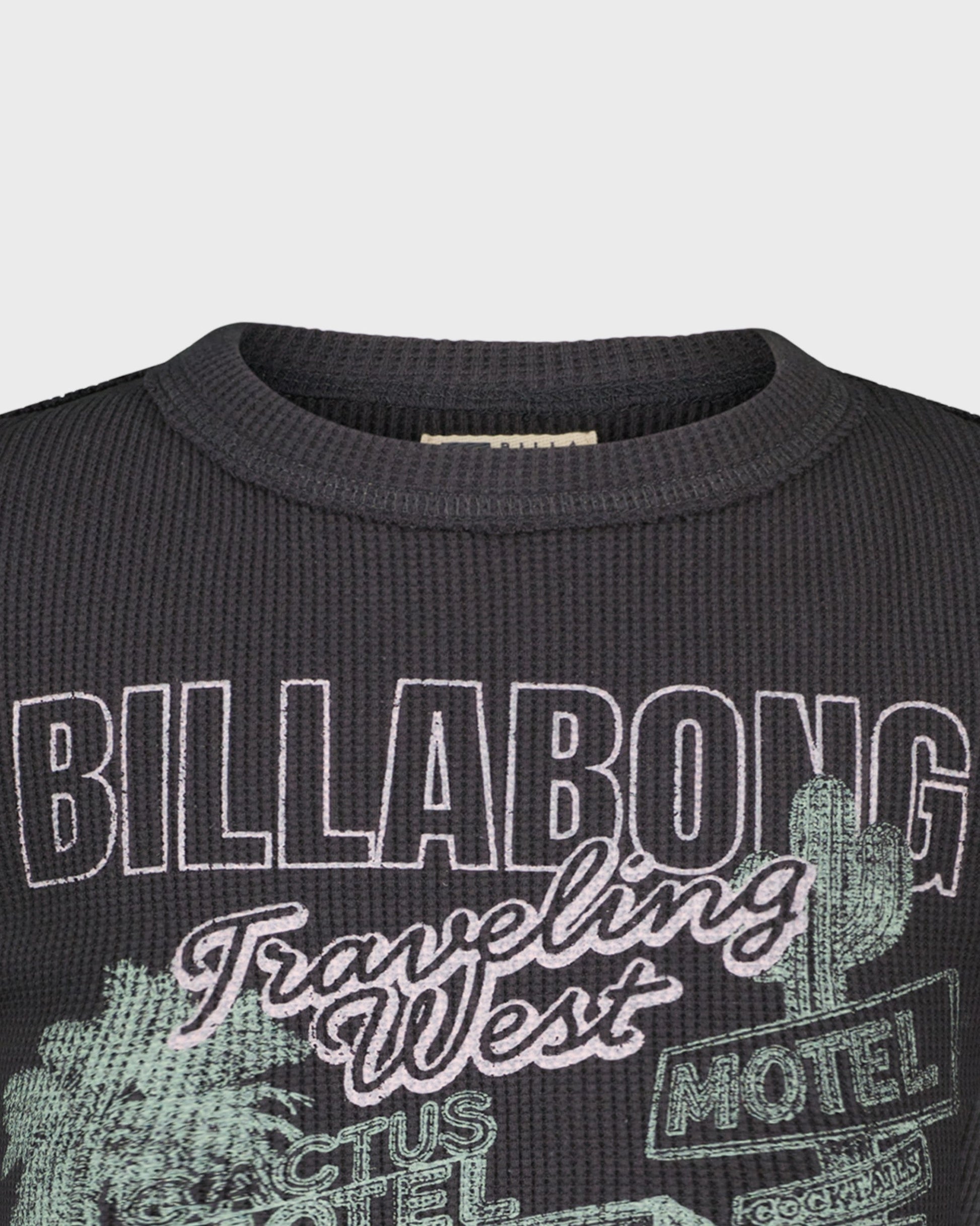 Black sweater with Billabong branding and cactus graphics on a gray background