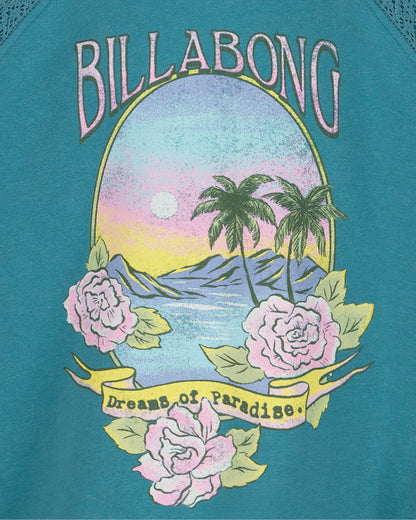 Billabong logo with a scenic design featuring palm trees, flowers, and mountains on a teal background.