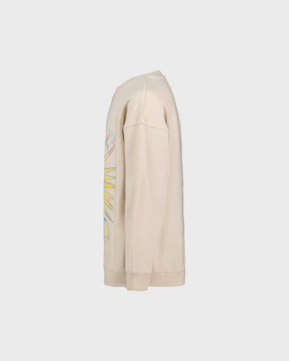 Beige sweatshirt with colorful graphic on a light gray background