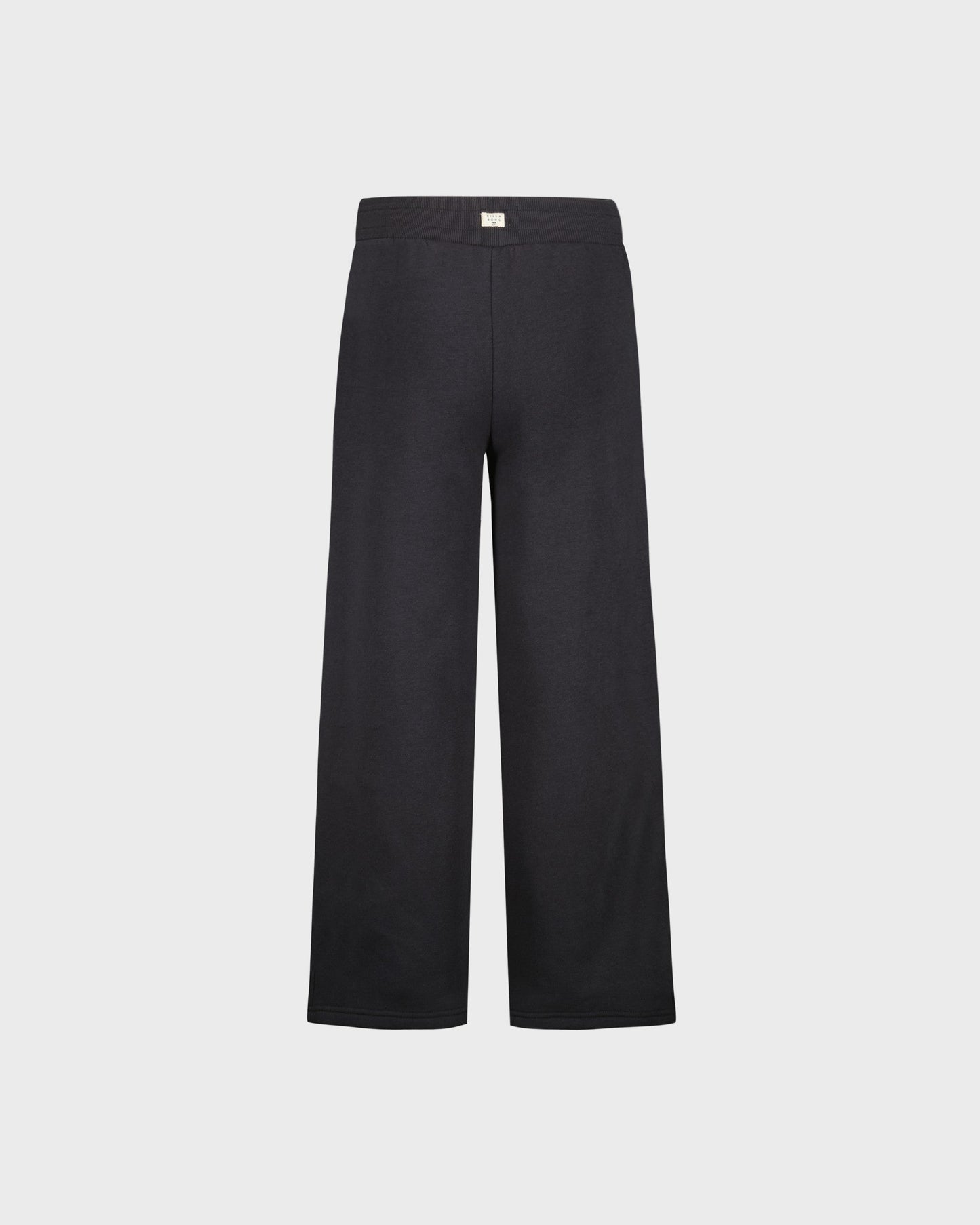 Black pants on a light gray background