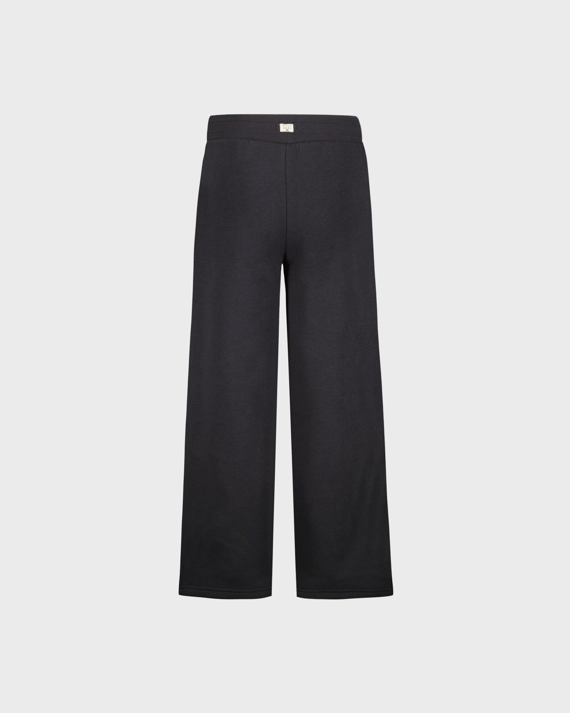Black pants on a light gray background