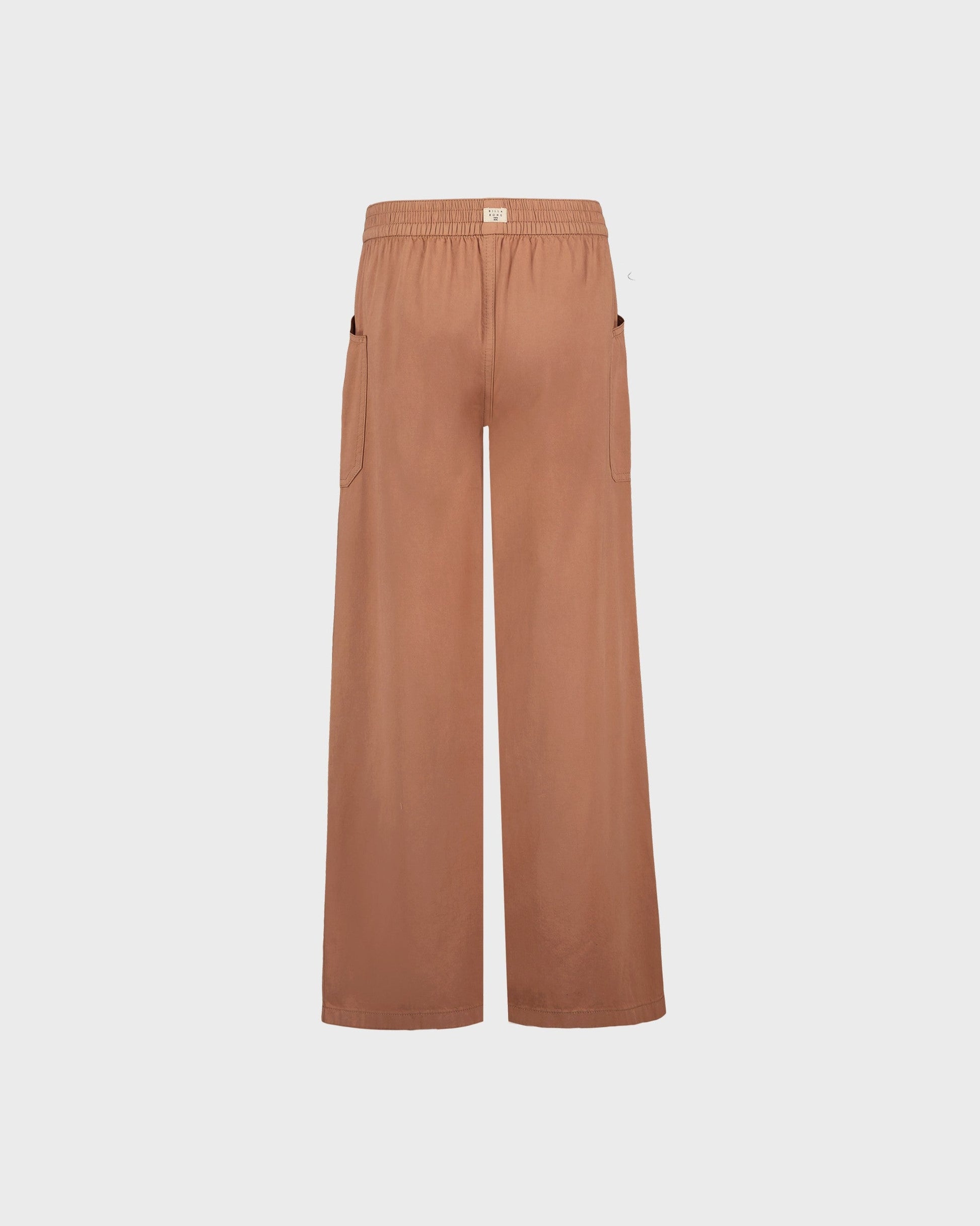 Brown wide-leg pants on a light beige background