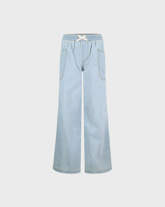 Light blue denim pants on a white background