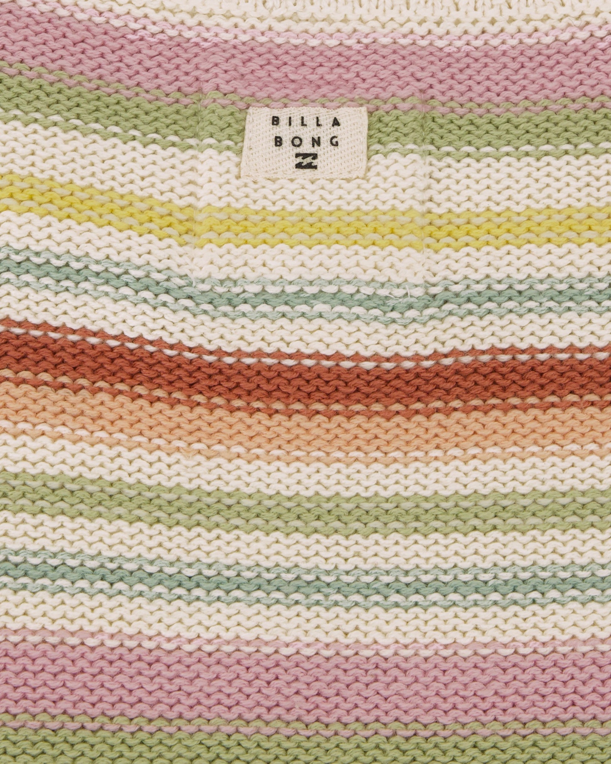 Striped fabric with multicolor pattern and Billabong logo.